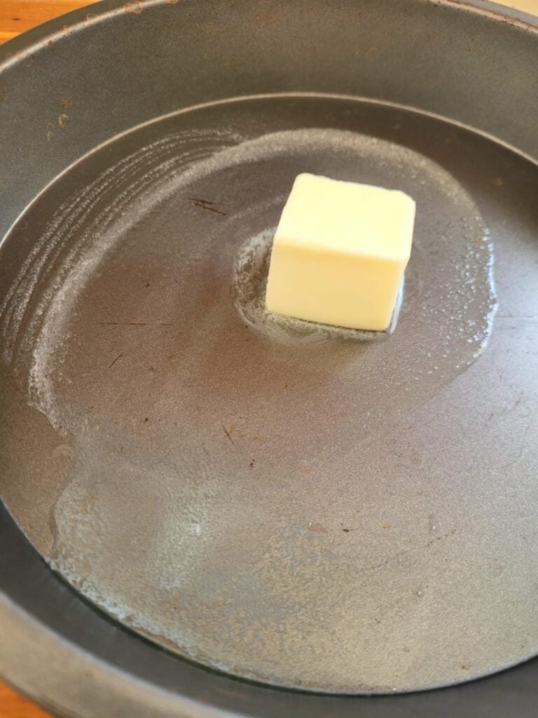 add butter to your metal baking pan for crispy cornbread edges