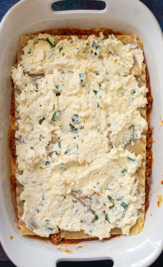 adding ricotta to pasta