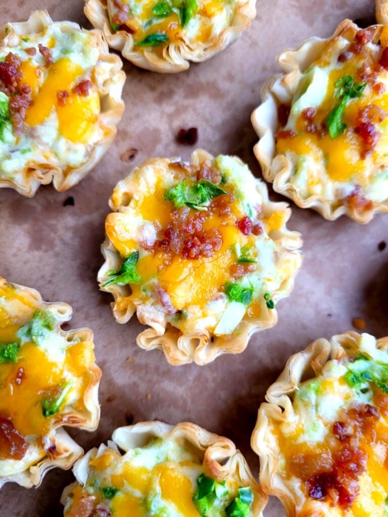 Bite-sized Jalapeño Popper Phyllo Cups are an easy, cheesy appetizer made with cream cheese, jalapeños, and bacon in a crispy phyllo shell.. perfect for parties and game day.