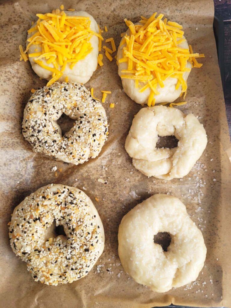 mix of bagel flavors on a tray
