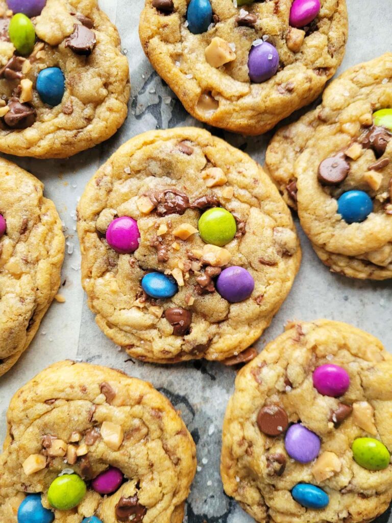 colorful fun cookies on a baking tray