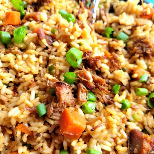 Make smoked pork fried rice at home thatโs better than takeout! This is a pork fried rice recipe with leftover pork, veggies, and savory sauce.. plus my cheat rice hack if you forgot to make rice the day before.