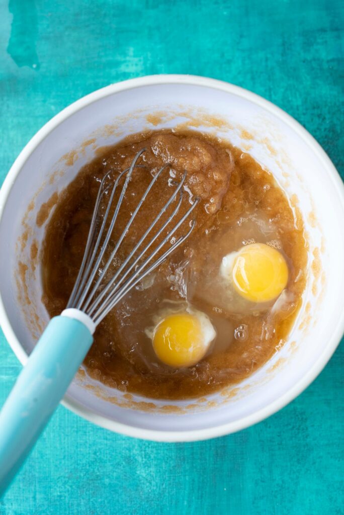 brown butter, sugar and eggs in a bowl