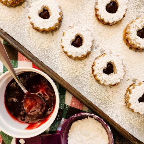 Raspberry Linzer Cookies are buttery almond shortbread, sweet raspberry jam, and zero stress. These are classic European-style holiday sandwich cookies that look fancy but are surprisingly easy to make.