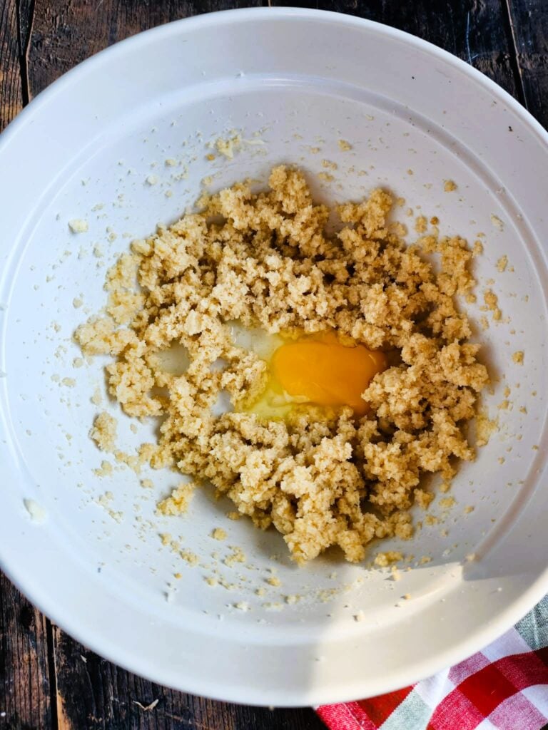 adding the wet ingredients for red cookies