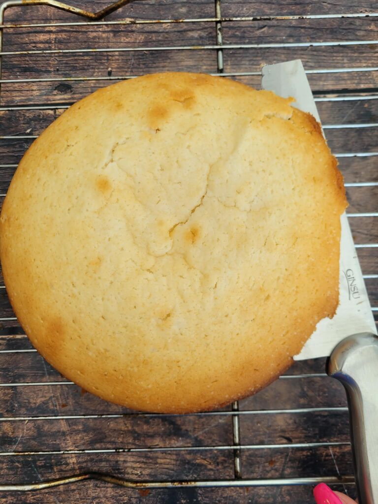 slicing two cakes into four to layer