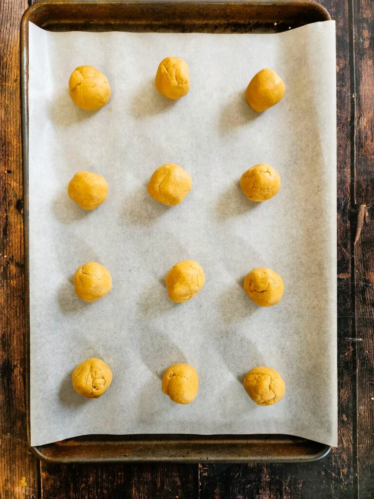 rolled cookie dough on a baking sheet