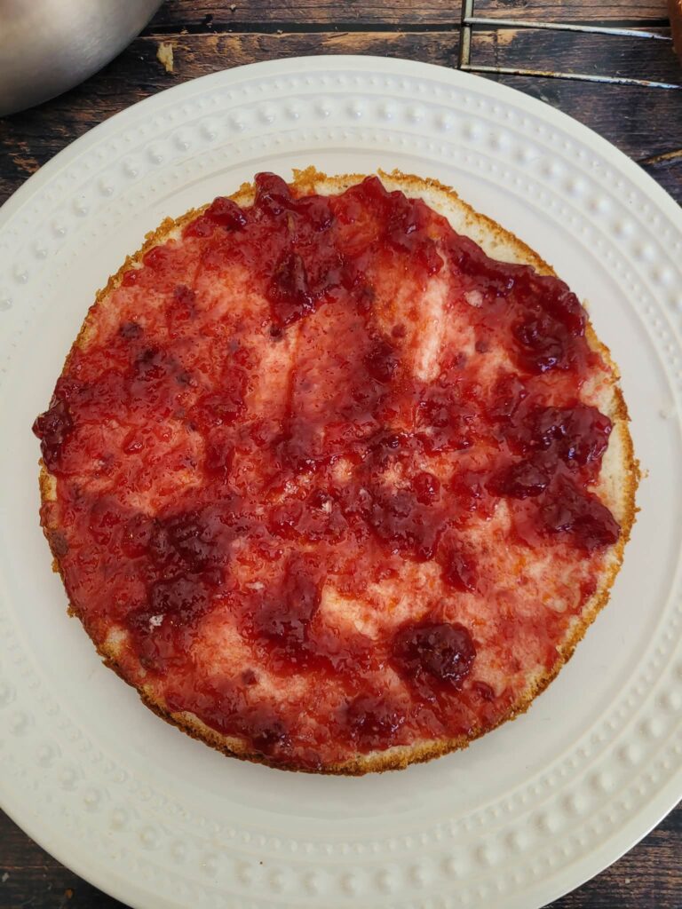 raspberry jam on cake layer