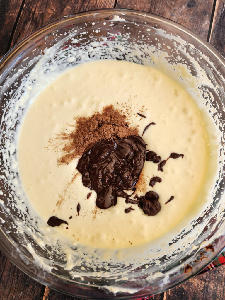 adding chocolate to the cheesecake